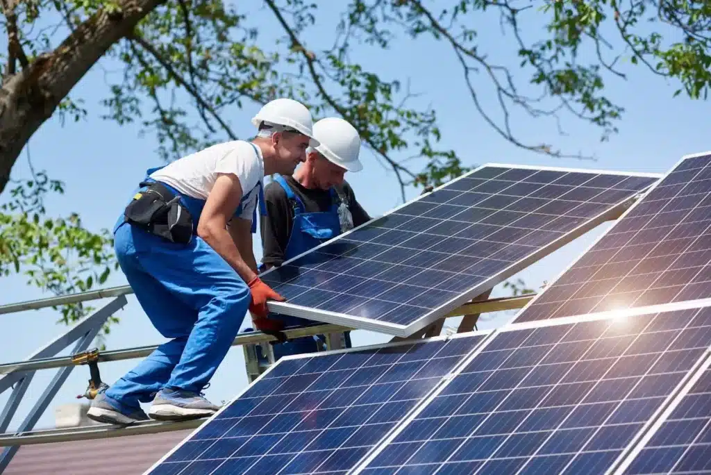 technicians installing solar photovoltaic panels